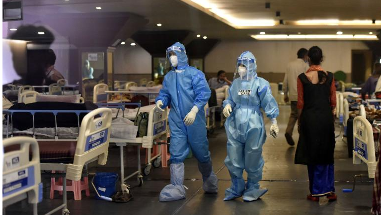 Medical staff attend to patients in delhi